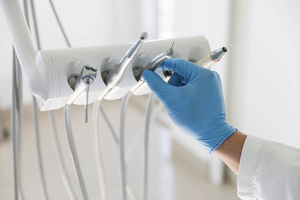 Professional Tooth Extraction technician working in Wingate, NC